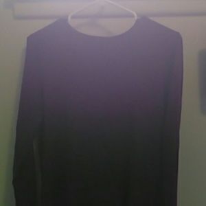 Plain purple-maroon tight shirt.